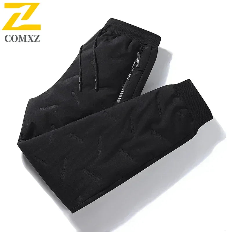 Stay Warm and Stylish This Winter with Our Men's Casual Waterproof Down Cotton Pants - Thickened Wool Joggers with Zipper Pockets for Outdoor Adventures